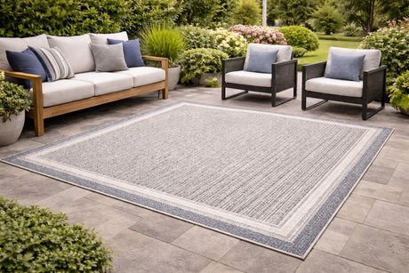 North Shore Pebble Outdoor Rug – Gray, black, and neutral tone patio rug